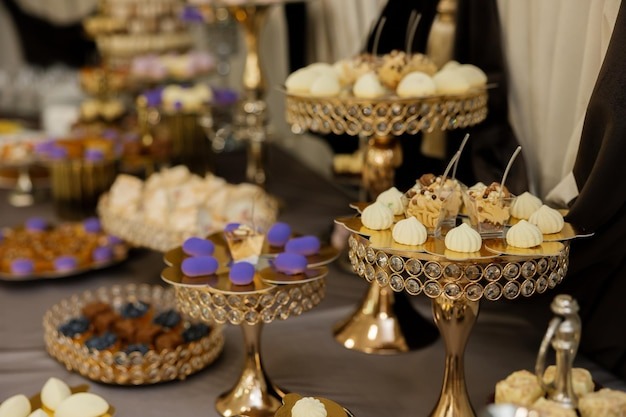 Delicious or scary? A bear breaks into a wedding reception and gobbles up the fancy desserts