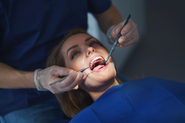 Dentist gives stark warning over mistake that can worsen disease nearly half of people suffer with