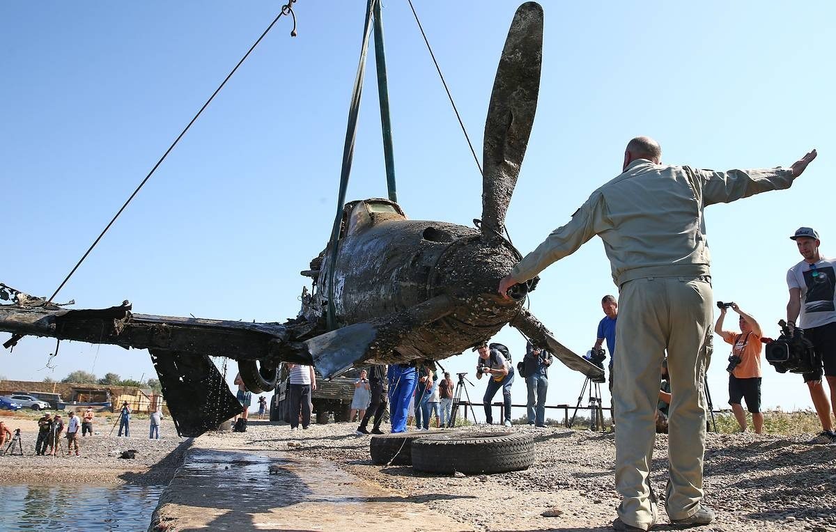 Navy Lifts Plane From Ocean Floor, Then They Look Inside