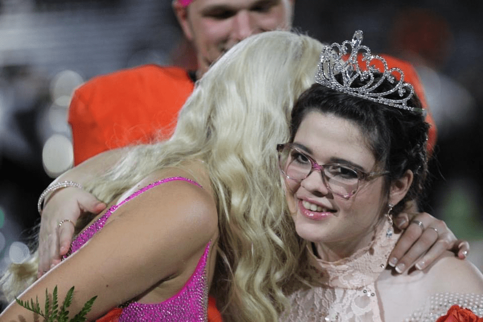 The king took off his crown when the girl was named homecoming queen