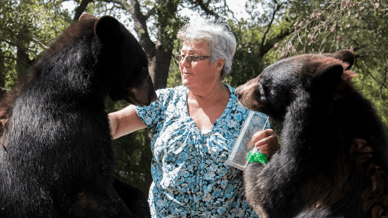 This old lady lives with a brown bear