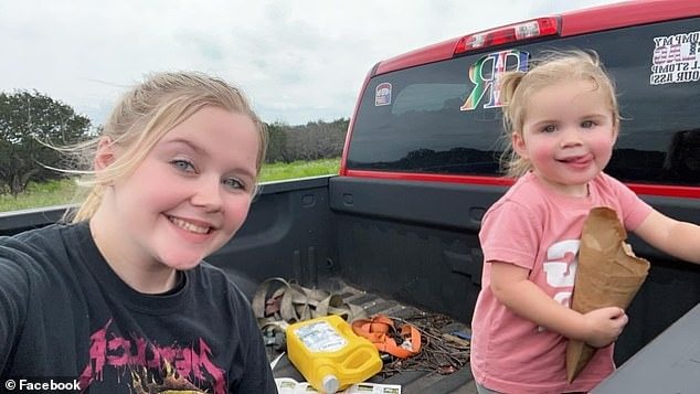 Giraffe lifts toddler out of a pickup truck at Texas wildlife center