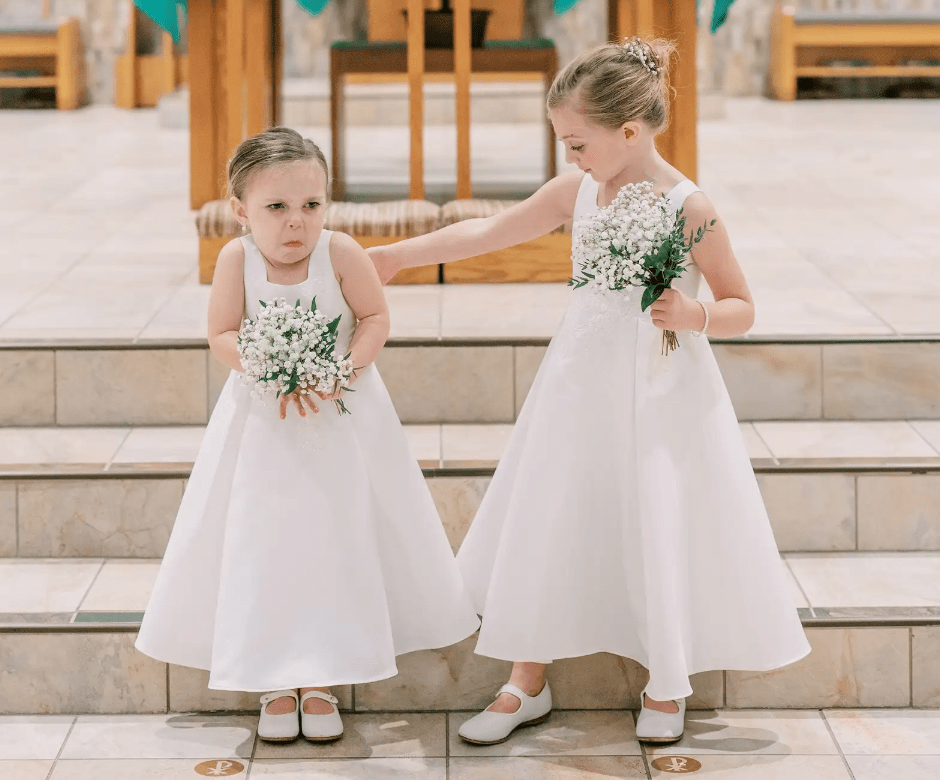 Everyone was looking at the newlyweds. But then the camera showed their daughter