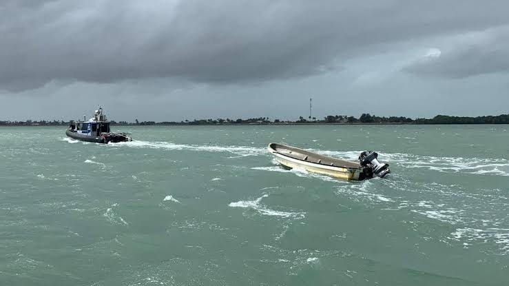 The fishermen whose boats had capsized after colliding with the mysterious sea creature were speechless