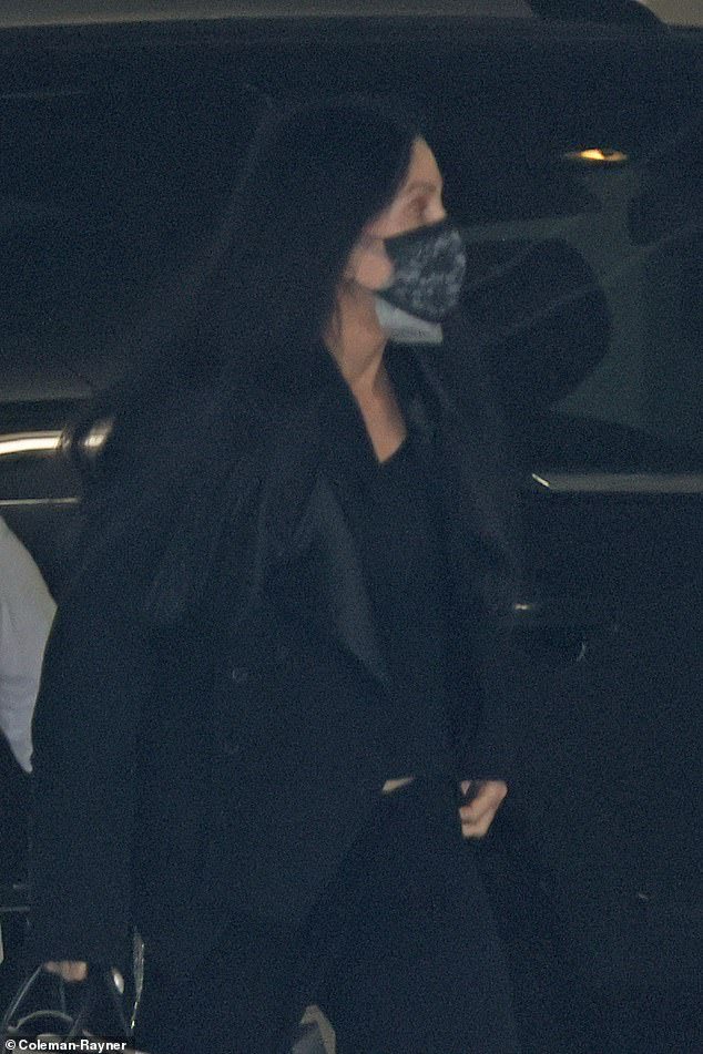 Fans zoomed in on a new photo of Cher—and spotted a strange detail on her stomach
